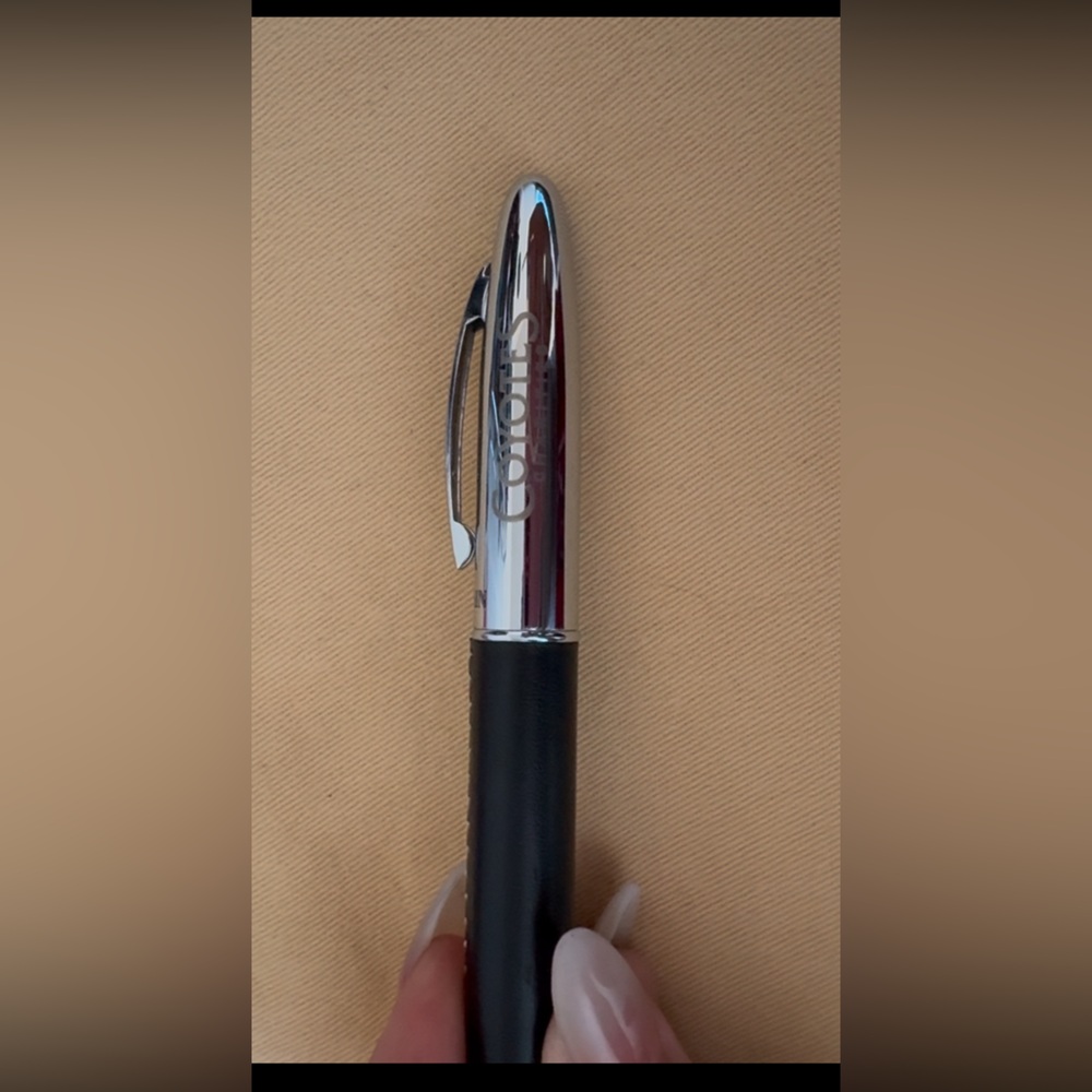 Balmain leather wrapped pen/silver